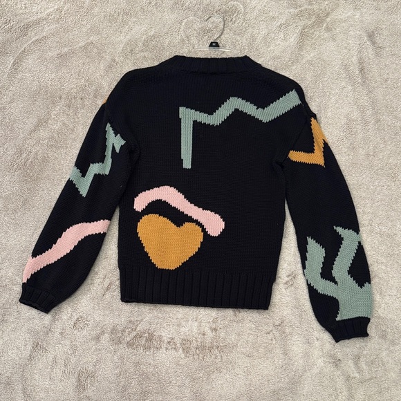 Amour Vert Black Sweater with Abstract Pink, Green, and Orange Design - Picture 3 of 4